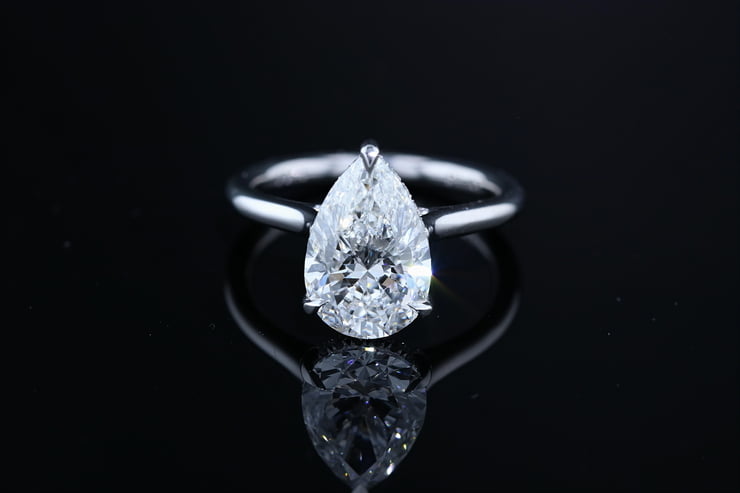 Pear shape diamond solitaire engagement ring