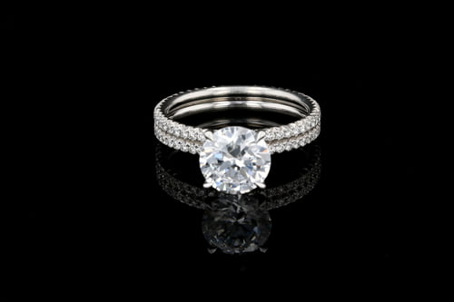 Side Stone Two Row French Pave' Solitaire