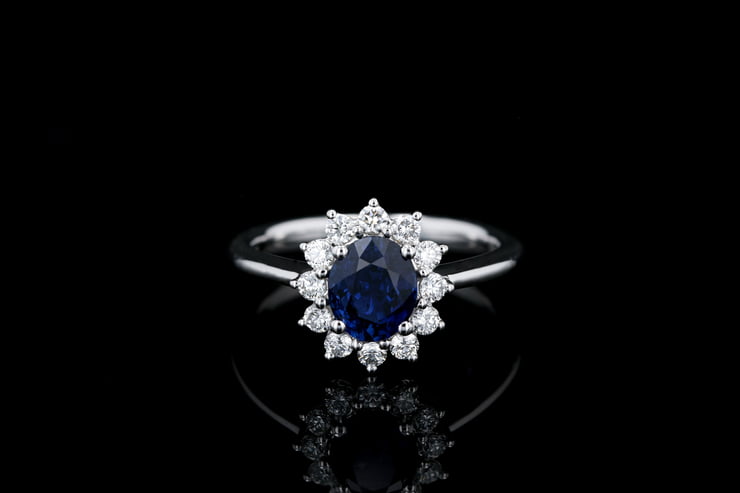 Oval Blue Sapphire Flower Halo