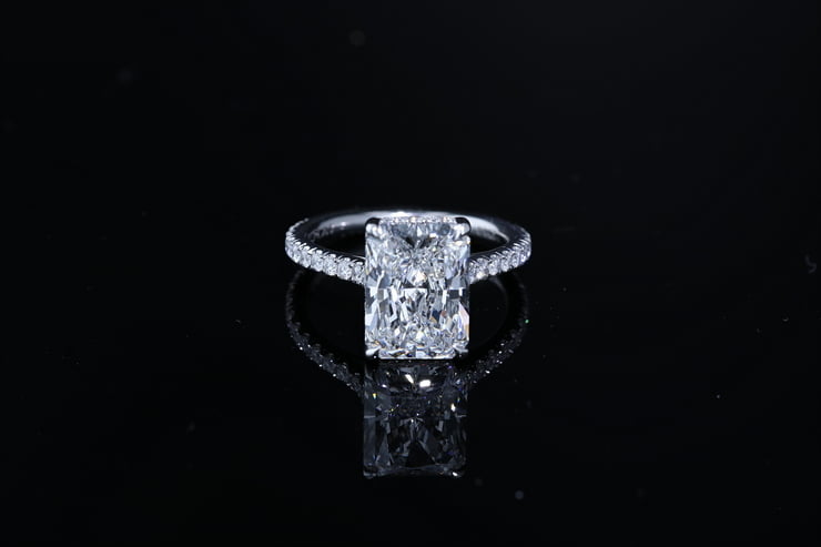 Radiant Cut Side Stone engagement ring