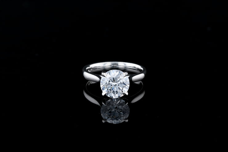 Solitaire with Eagle Claw Prongs, Tapered Band