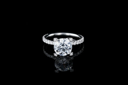Side Stone Round Solitaire Pave’ Set V Prongs