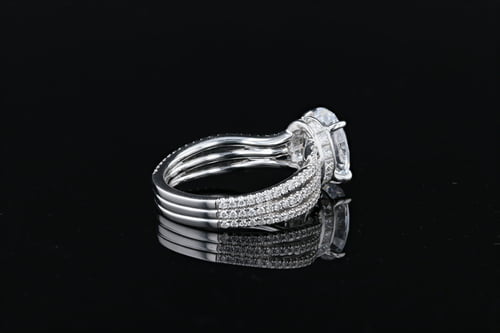 Oval Solitaire Wavy Pave’ Bands