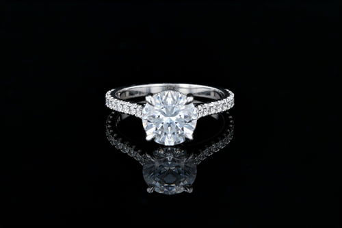 Side Stone Round Solitaire, Pave’ Under Bezel