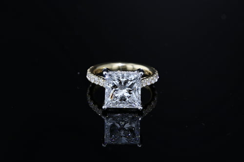 Side Stone Princess side stone engagement ring