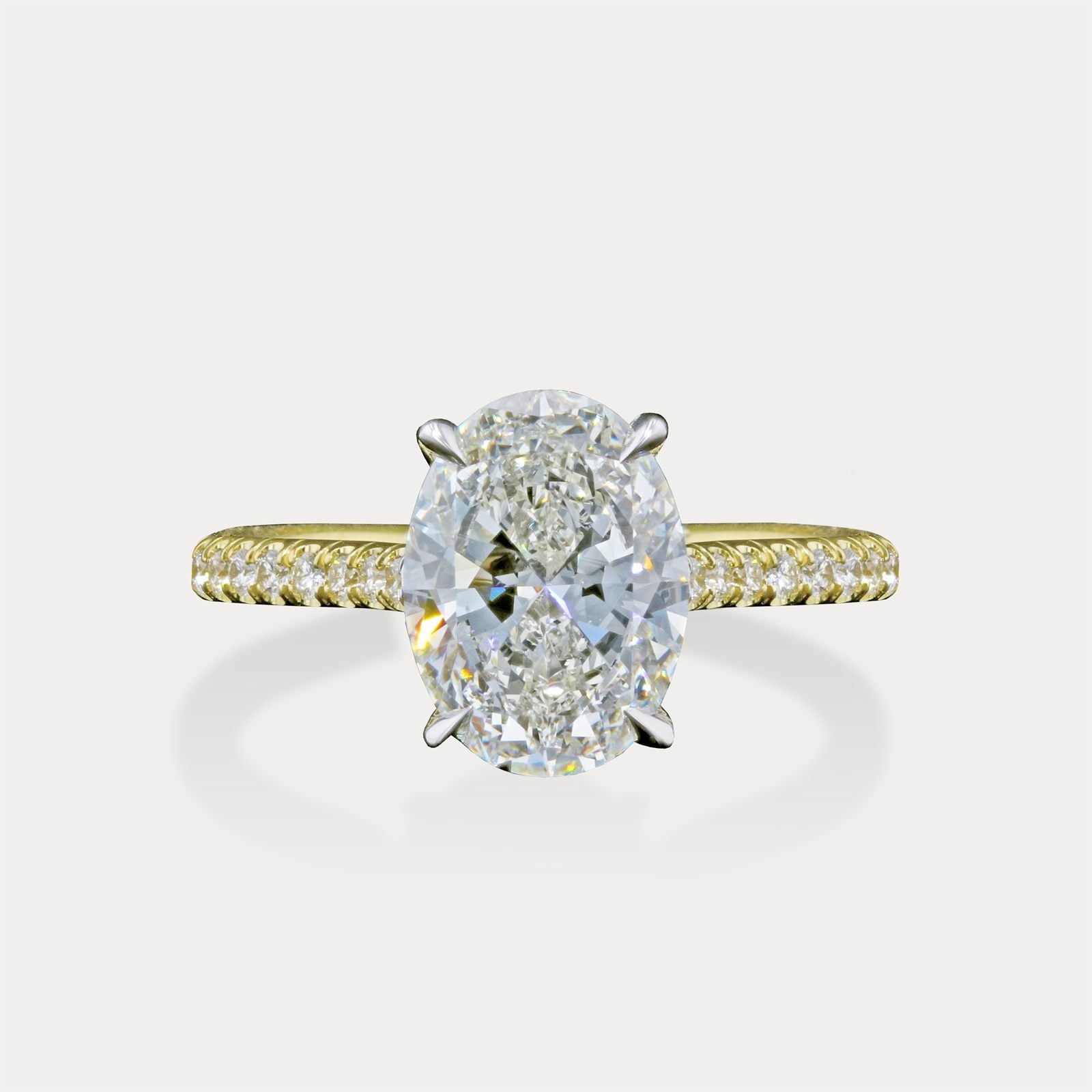 Oval Hidden Halo Yellow Gold
