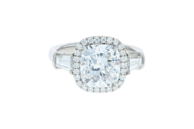 Cushion Three Stone Platinum Halo Ring With Baguettes