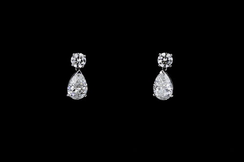 Pear and Round Dangling Diamond Earrings