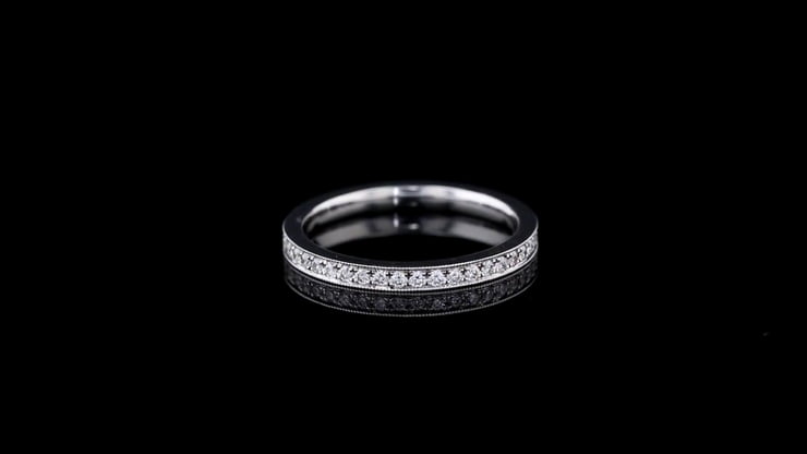 Bright Cut Edge Pave Set Wedding Band in Platinum