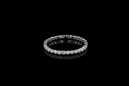 Round Bezel Set Diamond Band