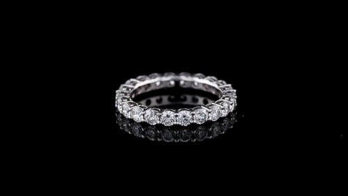 Shared Prong Eternity Band With Round Brilliant Cut Diamonds